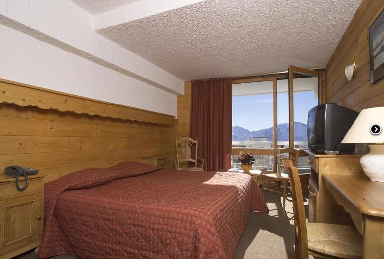Hotel Le Dome Alpe d'Huez Rum bild